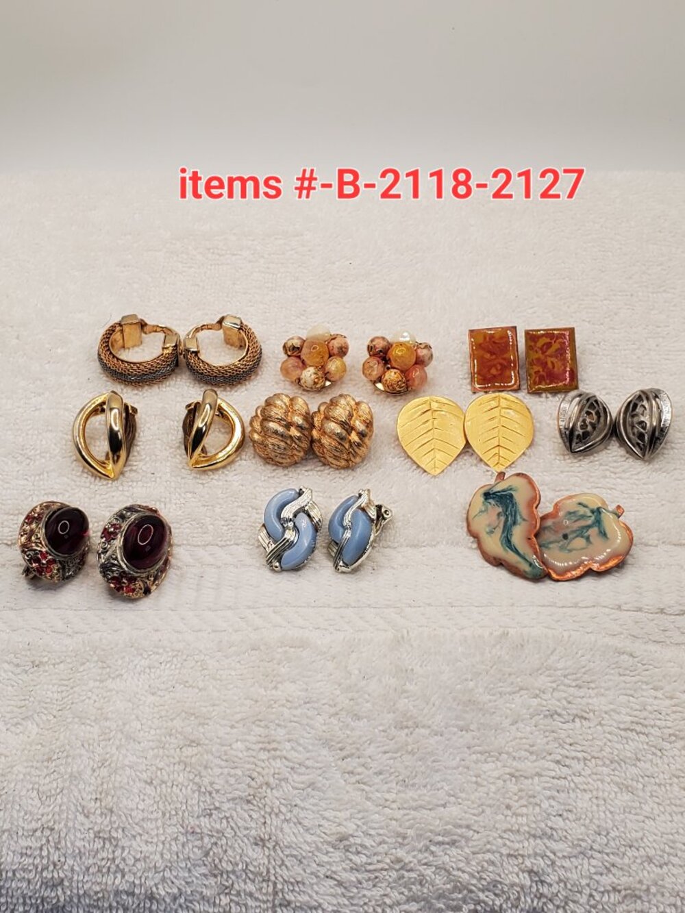 10 Pair of clip on Earrings, items # B-2118-2127,. wt. 145 grams.